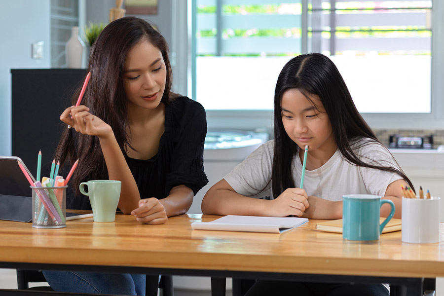 student and tutor together at a desk in Bakersfield